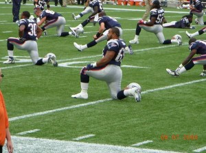 Steve Fifita stretches before his 1st game as a New England Patriot, one year after success as a Miami Dolphin...we hope for a "Speed Kills Superbowl!"